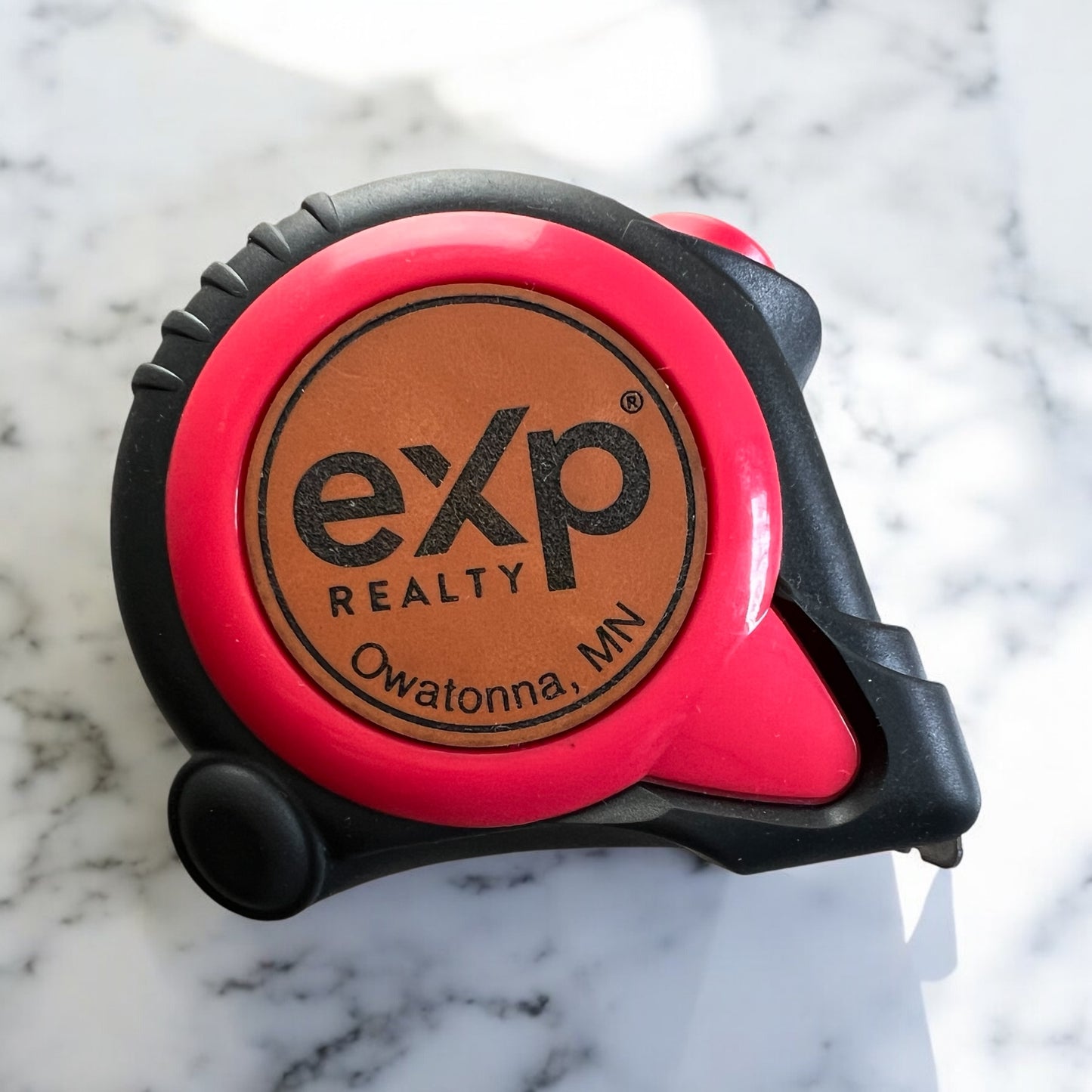 Personalized 25-Foot Heavy-Duty Tape Measure with custom engraved leather patch showing name