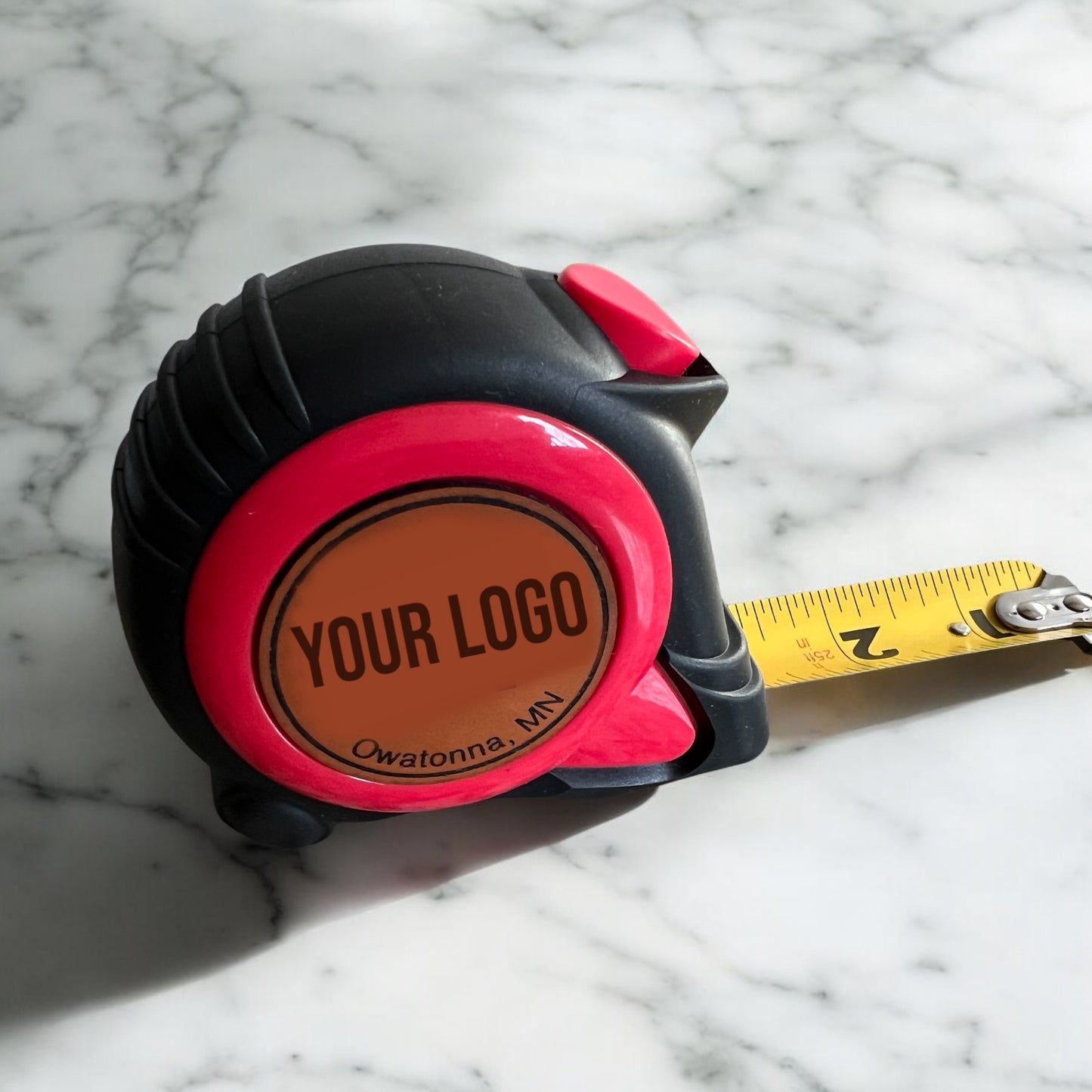 Heavy-duty tape measure extended showing measurement markings and durable construction