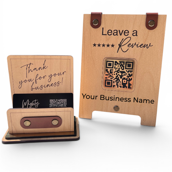 Personalized wooden business card holder and google review display set on a white background, featuring engraved text, a QR code window, and brown leather accents.