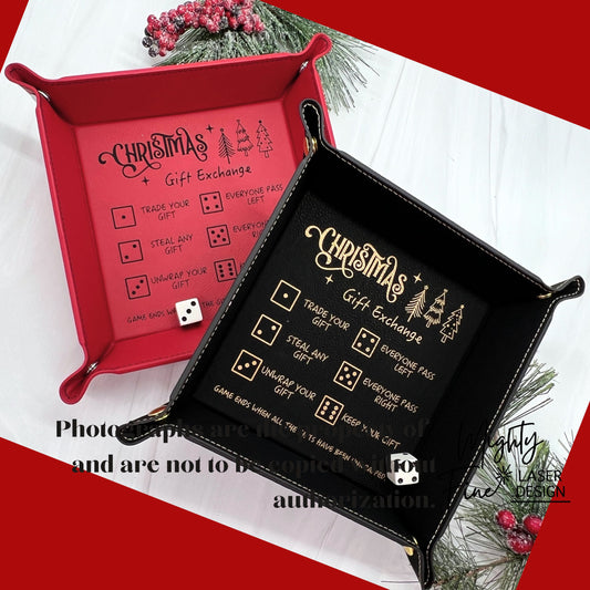 Christmas gift exchange dice trays in red and black with dice.  Laser engraved with game rules and made from vegan leather.