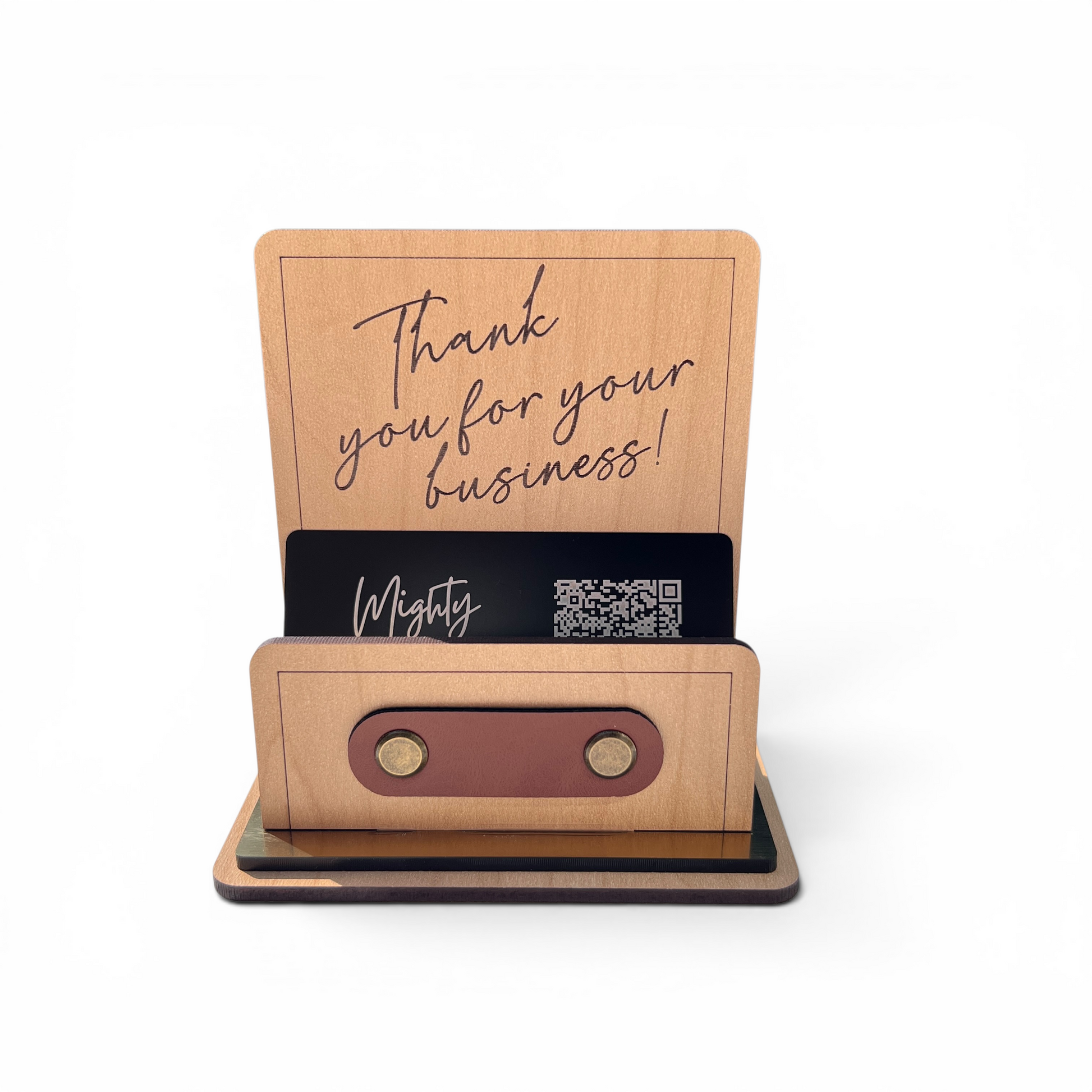 A rectangular wooden business card holder with engraved text reading 'Thank you for your business!' on the back panel, a  card slot holding a black business card, and a front holder with two metal rivets, shown on a white background.
