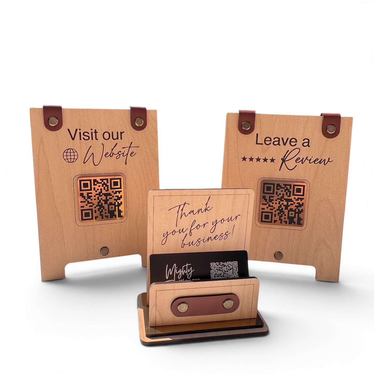 A set of  personalized wooden business displays and stands with brown leather accents, shown on a clean white background. The set includes two upright stands with placeholder text and QR codes, and a smaller horizontal card holder in the center with a business card inserted.
