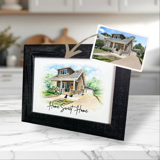 Watercolor picture of home in black frame